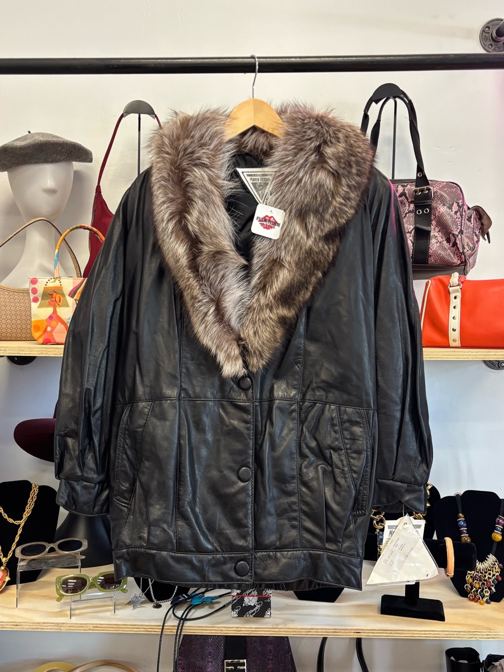 Vintage Black Leather Jacket with Raccoon Fur Collar